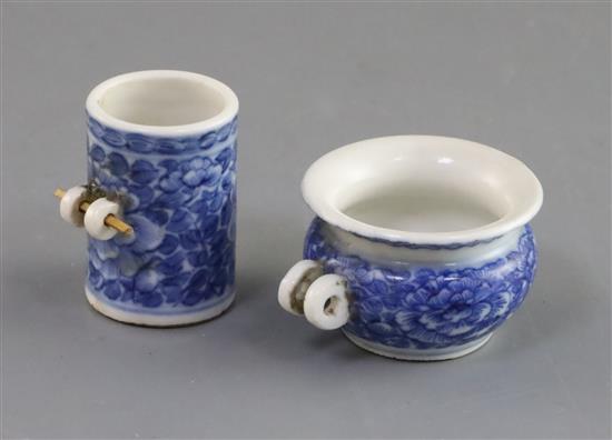 Two Chinese blue and white bird feeders, 19th century, H. 3.3cm and 1.9cm, boxed